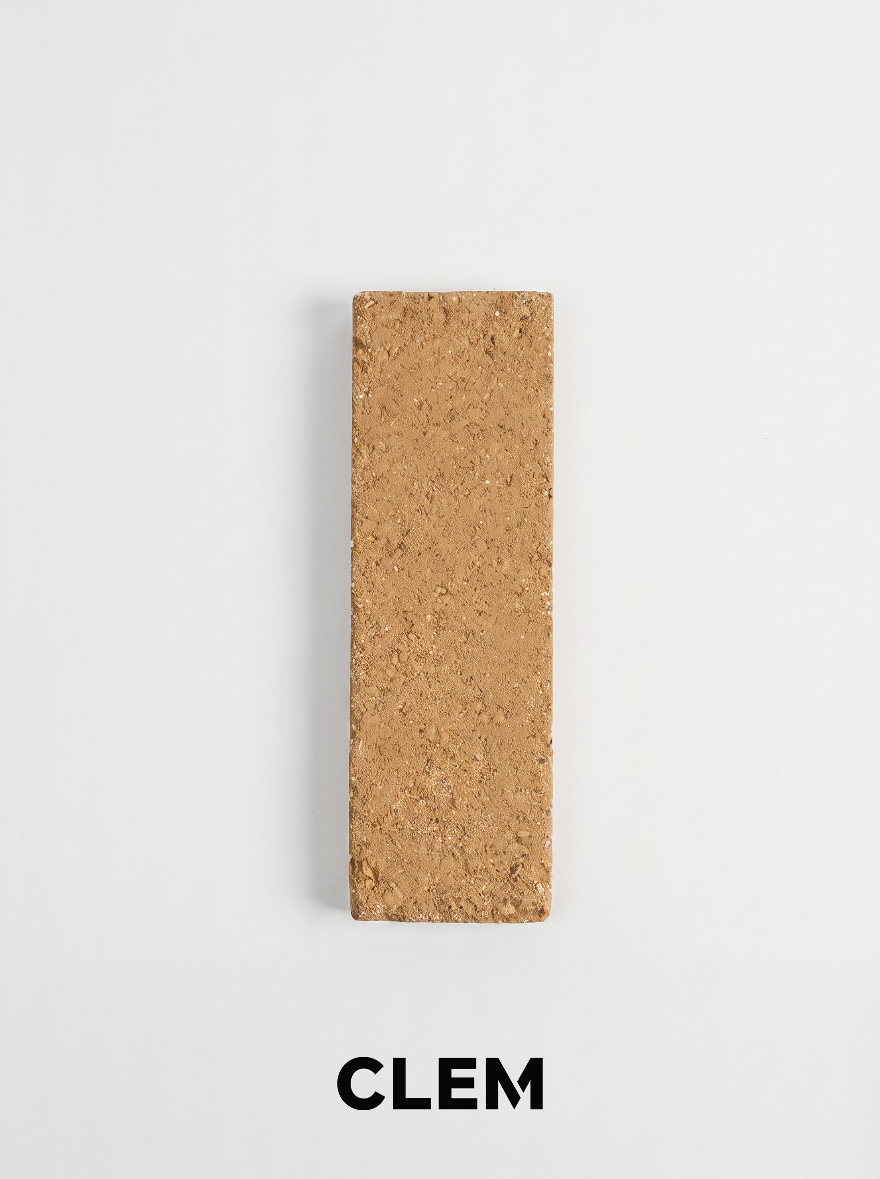 C07 Golden Ochre recycled tile sample by CLEM Stone Tiles on a neutral background