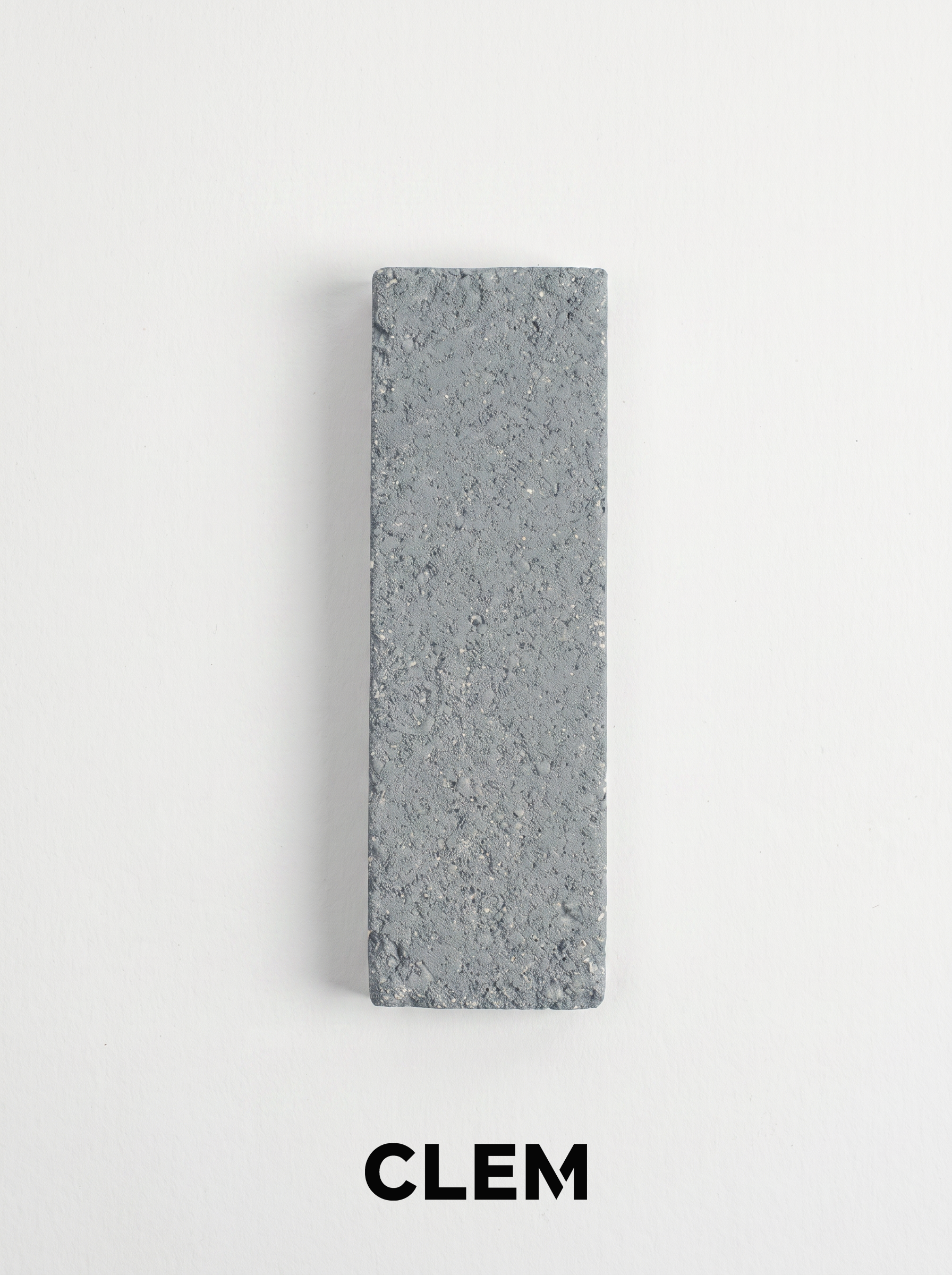 C12 Silver Grey recycled tile sample by CLEM Stone Tiles on a neutral background