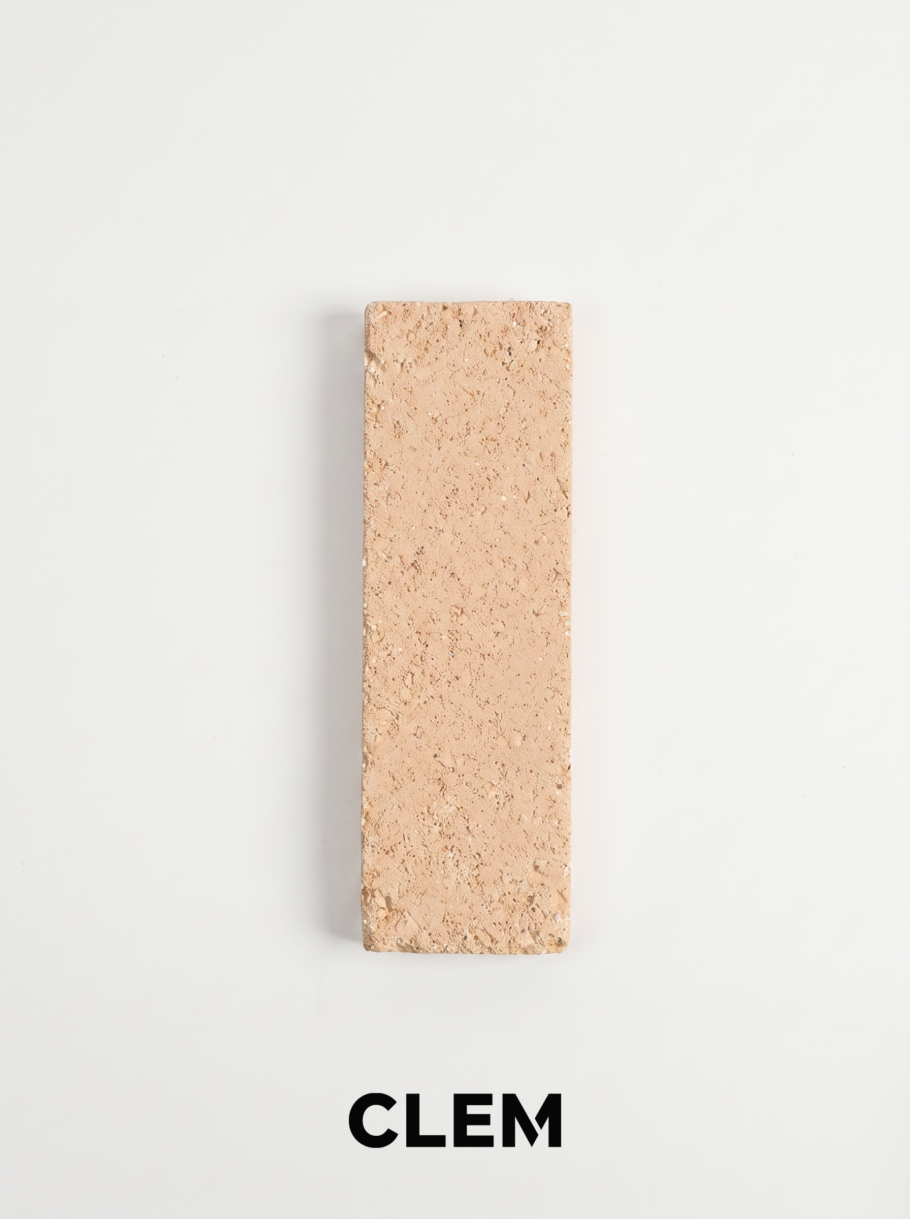 C18 Peach Sand recycled tile sample by CLEM Stone Tiles on a neutral background
